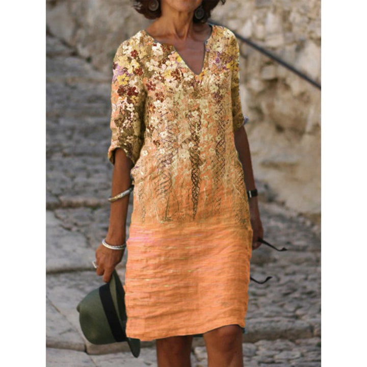 Women's knee-length midi dress in a material mix with floral lace surface, V-neck and crinkle texture Mune Fashion