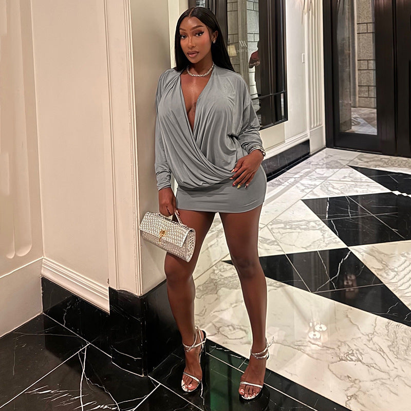 Women's draped wrap top with deep V-neckline, soft jersey drape, and fitted cuff Mune Fashion