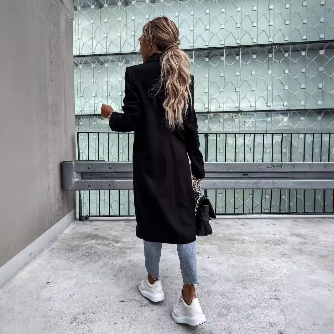 Women's classic wool coat with double-breasted button placket and oversized cut Mune Fashion