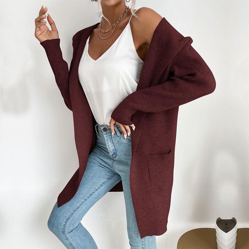Women's longer ribbed cocoon cardigan made of lightweight fine knit with patch pockets Mune Fashion