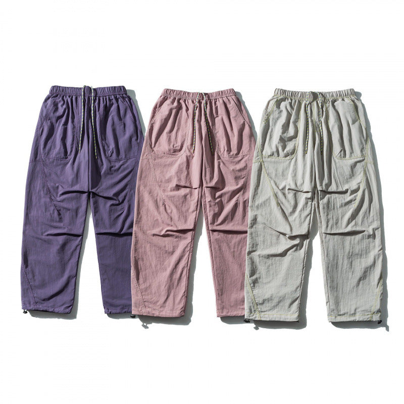 Unisex Loose-fitting outdoor pants with elastic waistband, drawstring, and adjustable leg cuffs Mune Fashion
