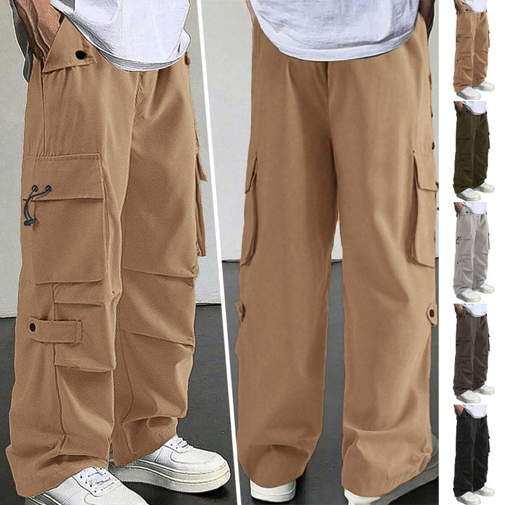Men's baggy cargo pants with utilitarian flap pockets, drawstring waistband, and reinforced seams Mune Fashion