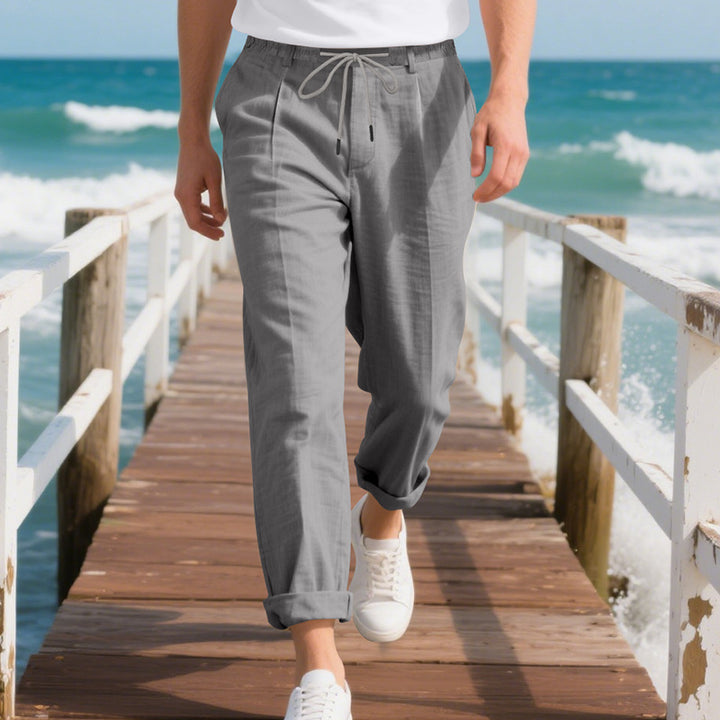 Men's beach-suitable linen blend lounge pants with elastic drawstring, subtle pleat, and rolled ankle hem Mune Fashion