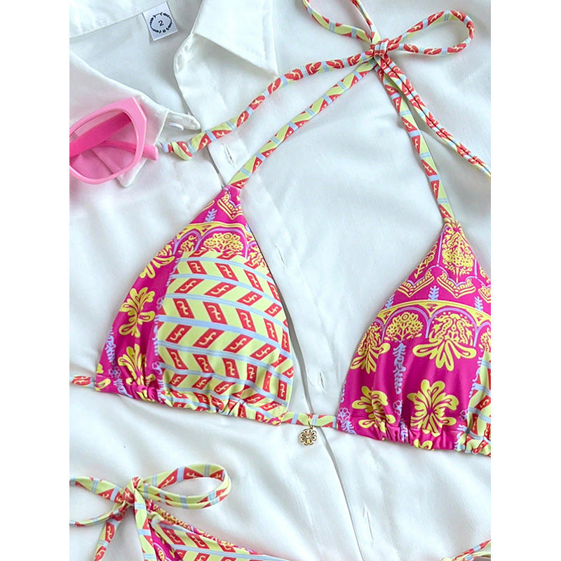 Ladies triangle bikini with playful pattern and adjustable lace-up details Mune Fashion