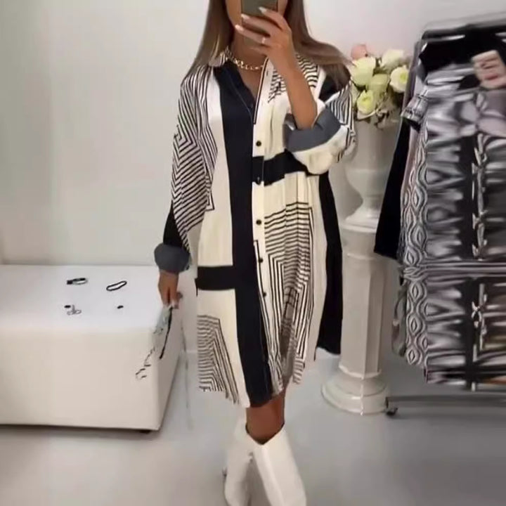 Women's knee-length A-line shirt dress with graphic line print, concealed button placket, and oversized cuffs Mune Fashion