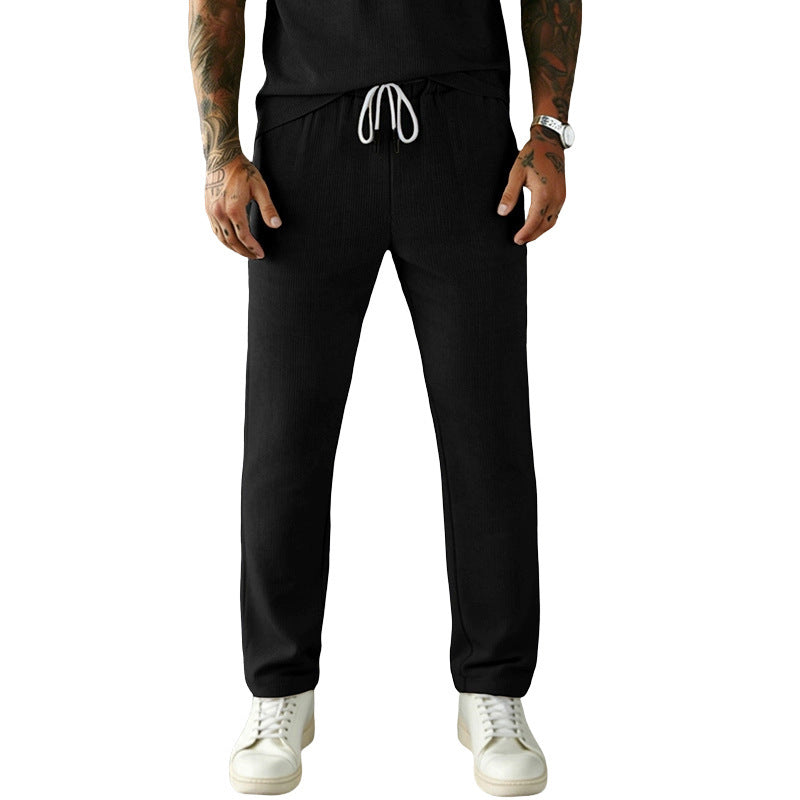 Men's narrow-cut comfort pants with elastic waistband, drawstring, and fine ribbed structure Mune Fashion