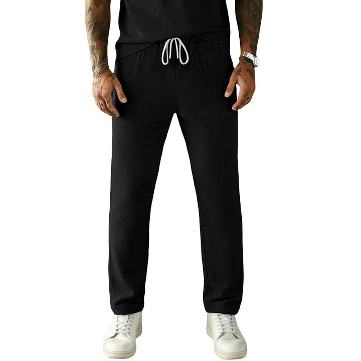Men's narrow-cut comfort pants with elastic waistband, drawstring, and fine ribbed structure Mune Fashion