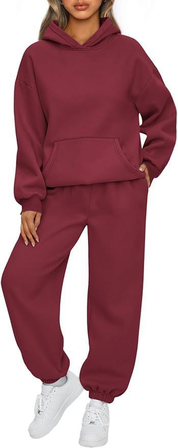 Women's oversized luxurious loungewear set hoodie with kangaroo pocket and wide-cut joggers with elastic ankle cuffs Mune Fashion