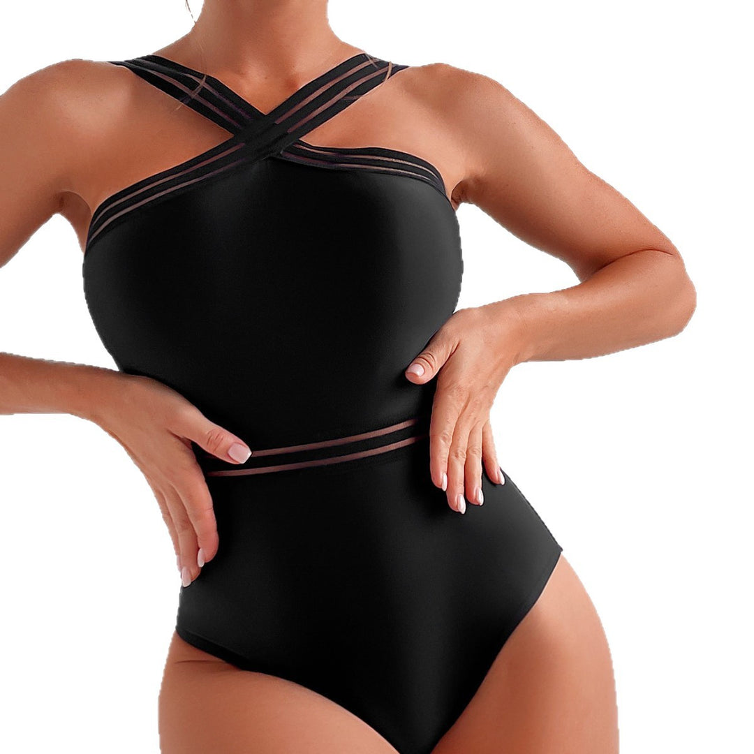 Ladies sporty jumpsuit with crossed straps and figure-flattering cut Mune Fashion
