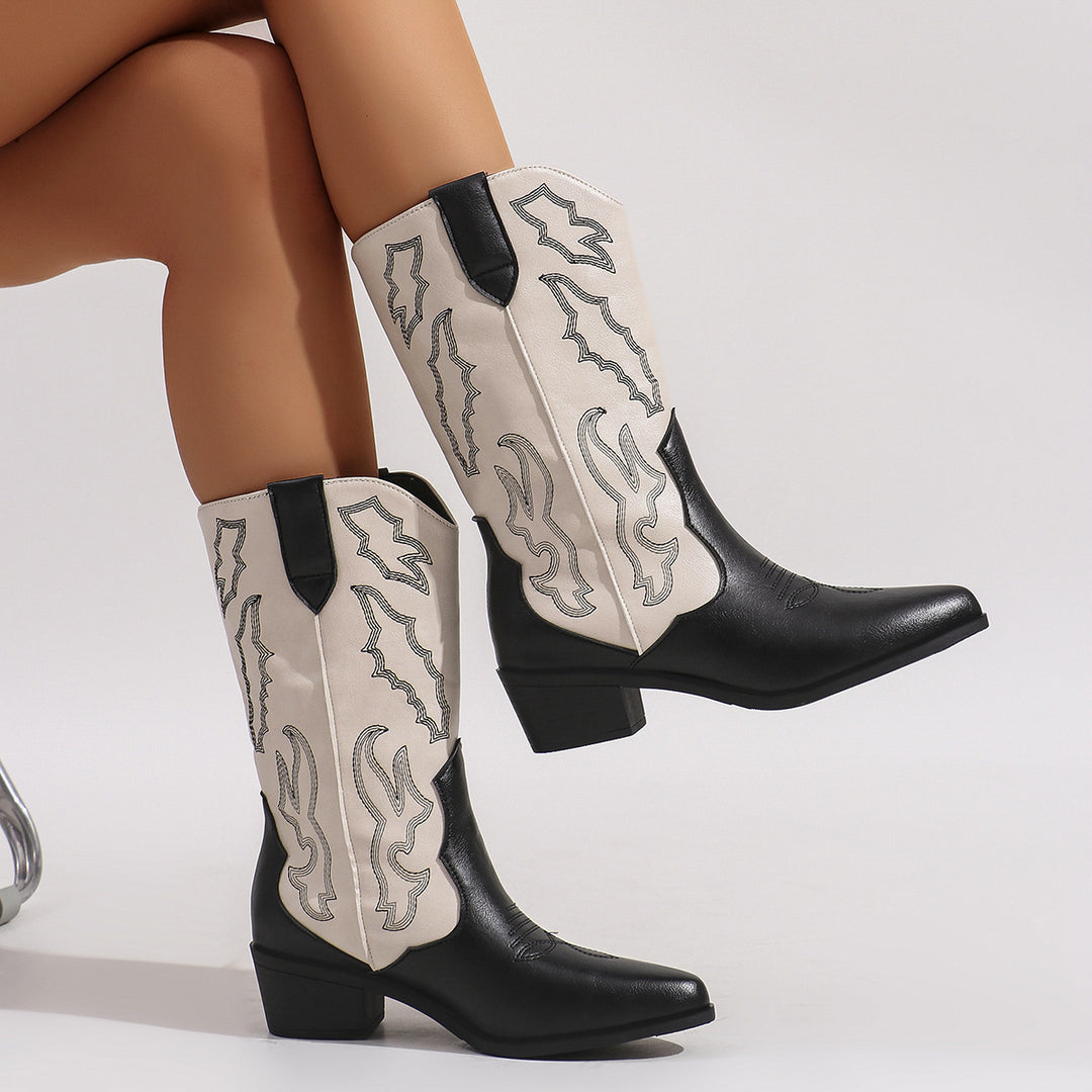 Women's cowgirl boots in western style with mid-high block heel, pointed toe cap, and decorative embroidery Mune Fashion