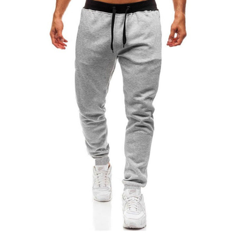 Men's tapered joggers with elastic comfort waistband, adjustable drawstring, integrated side pockets, and ribbed ankle cuffs Mune Fashion