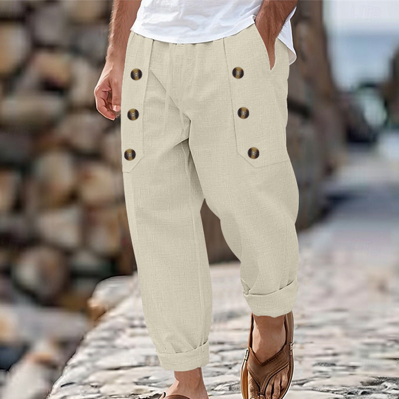 Men's loose linen trousers with decorative button stripes, rolled ankle cuffs, and side pockets Mune Fashion