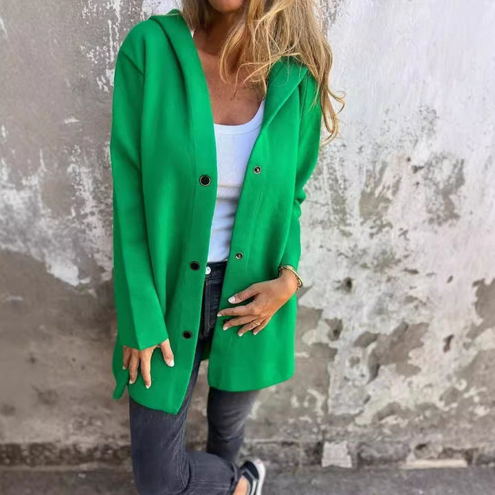Women's hooded coat with snap button placket and straight oversized cut Mune Fashion