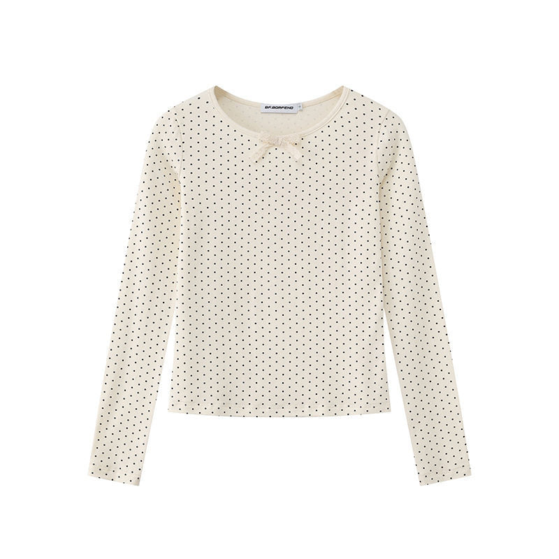 Women's long sleeve shirt made of soft cotton jersey with polka dot pattern and decorative knot on top