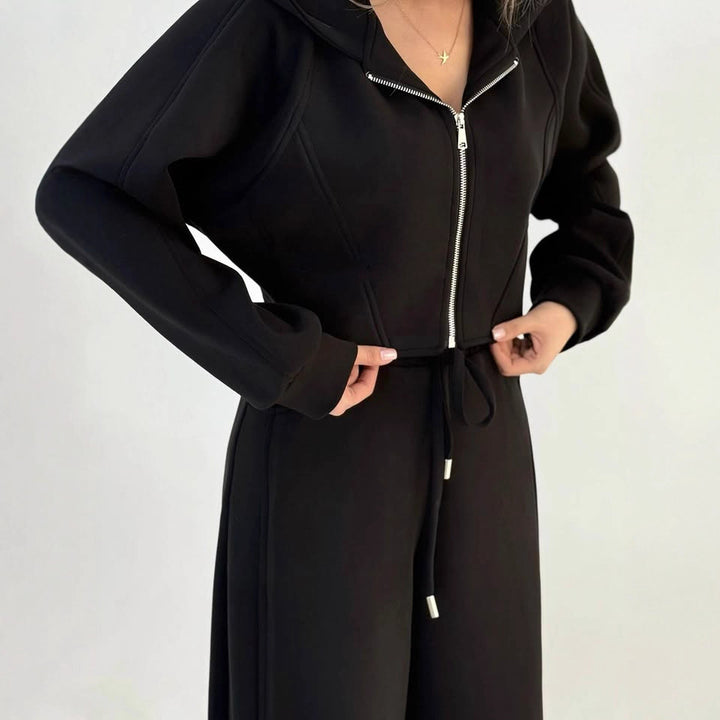 Women's loose high-waist lounge pants with drawstring, side pockets, and decorative seams Mune Fashion