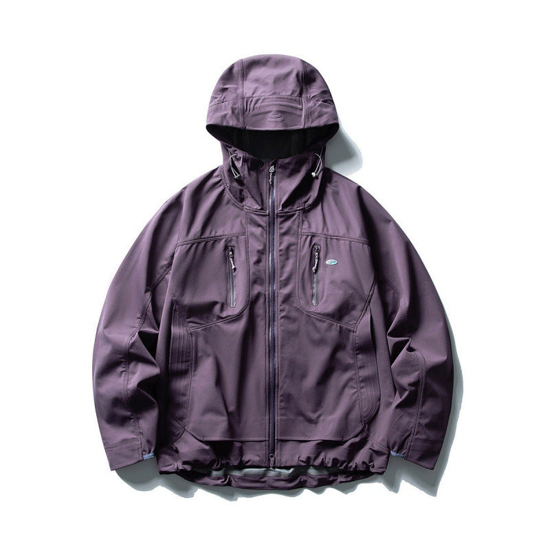 Unisex Technical Softshell Field Jacket with welded seams, four zippered pockets, and extended back part Mune Fashion