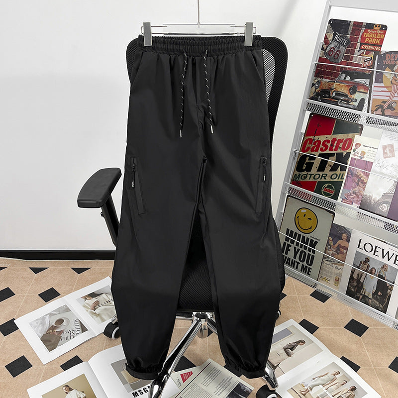 Unisex sporty jogging pants with adjustable waistband and side pockets Mune Fashion