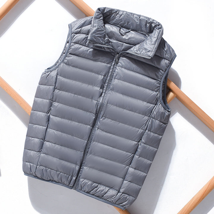 Women's lightweight packable quilted vest with high collar and wind-resistant microfiber shell Mune Fashion