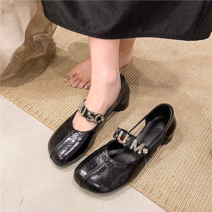 Women's Mary Jane ballet flats with decorative strap, rounded toe area and low block heel Mune Fashion