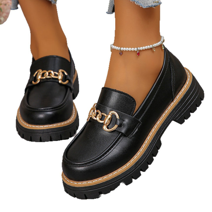 Women's shiny patent loafers with decorative metal buckle and profiled tractor sole Mune Fashion
