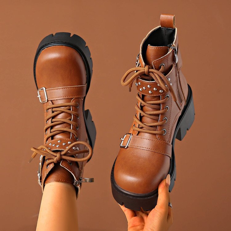 Women's rugged lace-up biker boots with decorative studded straps, side zipper, and textured platform sole Mune Fashion