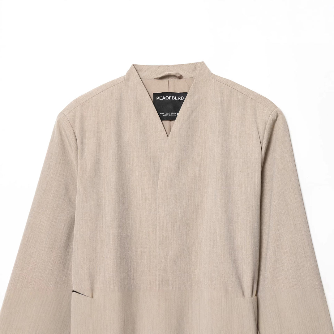Ladies non-tailored collarless blazer with V-neck and thin leather belt Mune Fashion