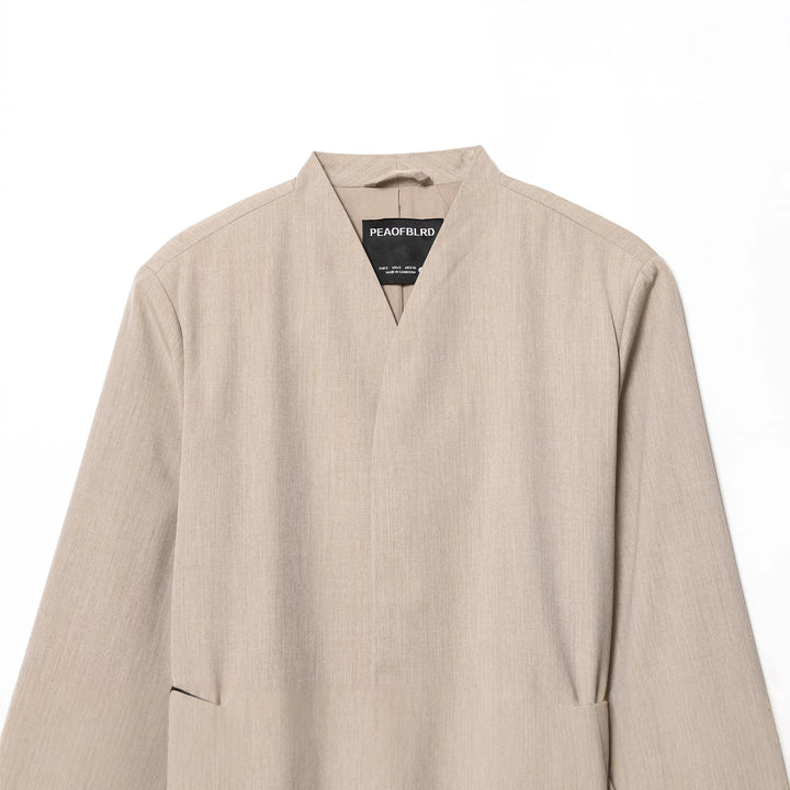 Ladies non-tailored collarless blazer with V-neck and thin leather belt Mune Fashion