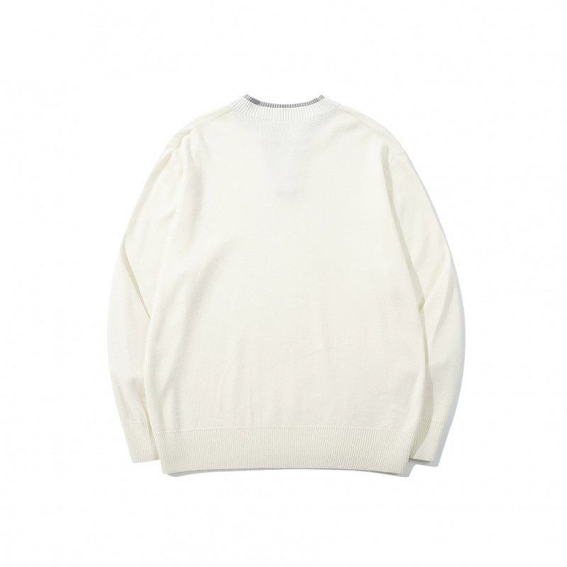 Unisex knit sweater with Henley button placket, contrast collar and boxy cut Mune Fashion