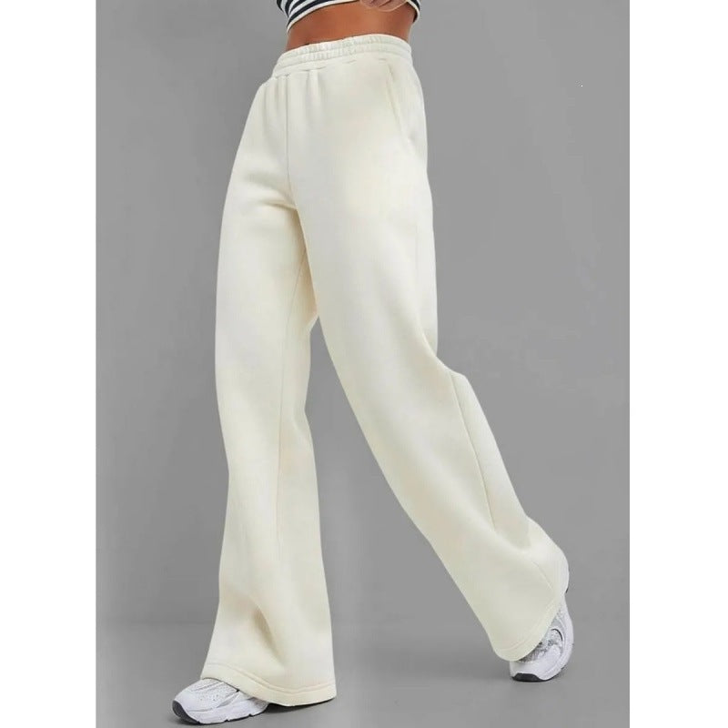 Women's flowing palazzo lounge pants with extra wide leg, elastic comfort waistband, and discreet side pockets Mune Fashion