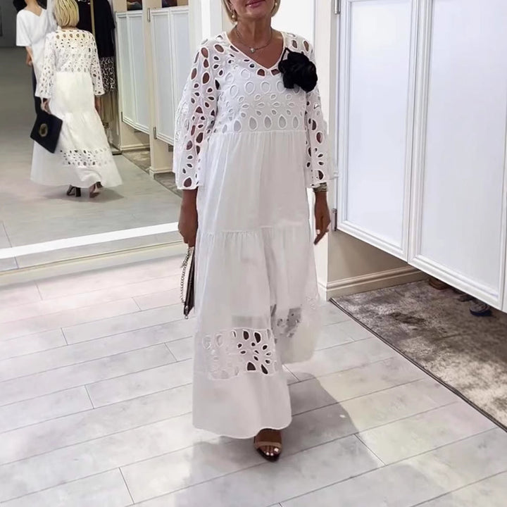 Women's maxi dress with openwork embroidery, V-neck, wide bell sleeves, and tiered hem Mune Fashion