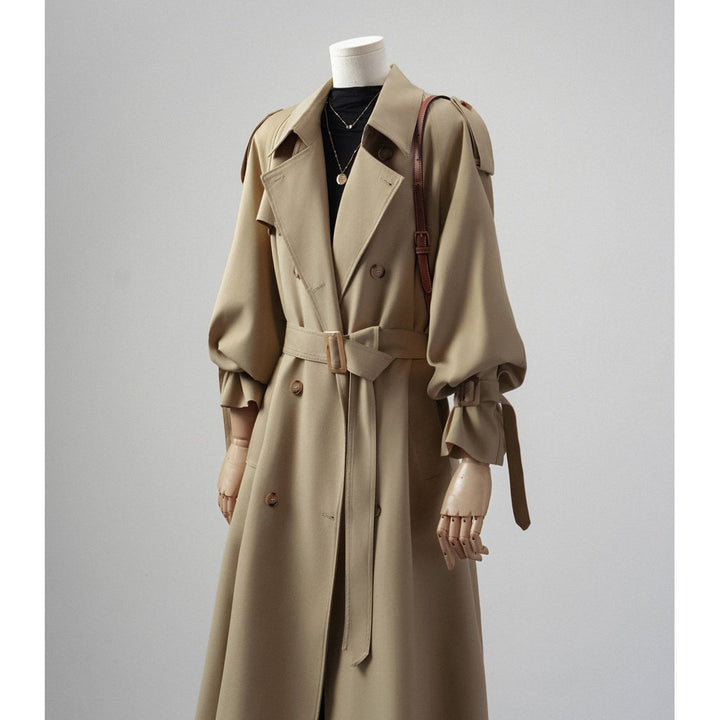 Women's trench coat with balloon sleeves, double-breasted cut and waist belt Mune Fashion