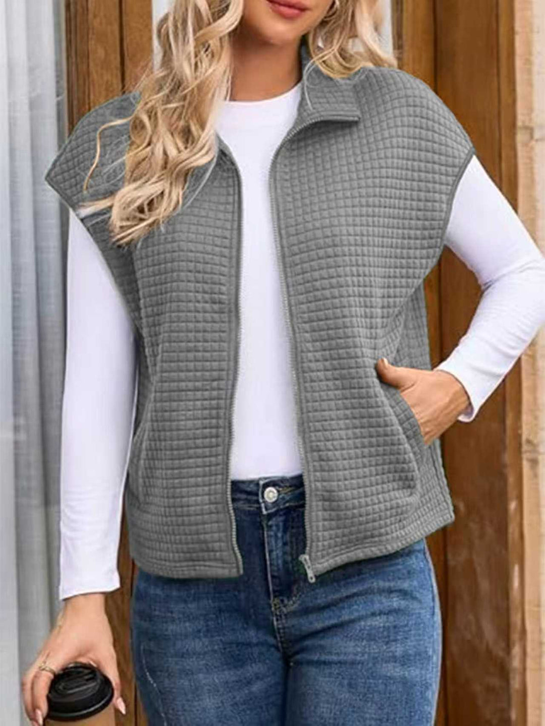 Women's padded vest with zipper, stand-up collar and side pockets Mune Fashion