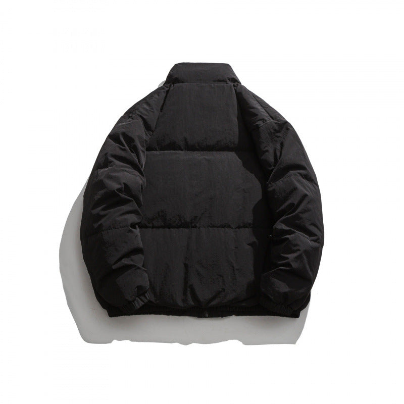 Unisex Oversized padded quilted jacket with high stand collar, large flap pockets and crinkle effect Mune Fashion