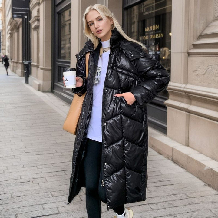 Mune | Women's long insulated puffer jacket with voluminous cut and practical side pockets