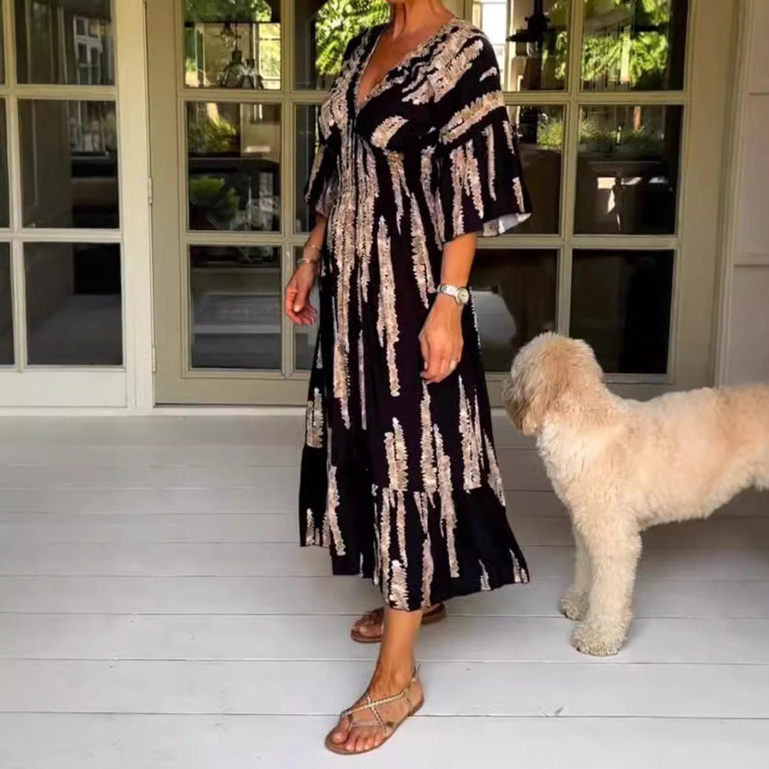 Women's maxi dress with V-neck, vertical brush print, gathered underbust seam and tiered ruffle skirt Mune Fashion