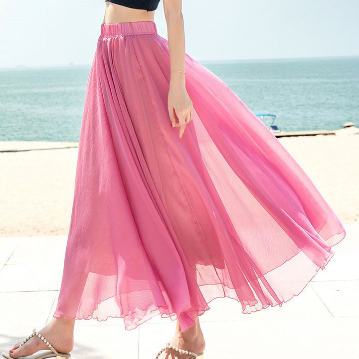 Women's flowing maxi skirt made of chiffon with elastic waistband and layered ruffle Mune Fashion