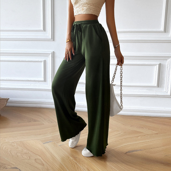 Women's wide lounge pants with elastic waistband, drawstring and side pockets Mune Fashion