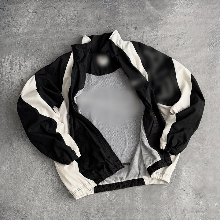 Unisex nan breathable lightweight wind and training jacket with mesh lining, stand collar and elastic hem Mune Fashion