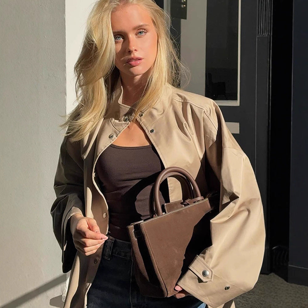 Women's oversized short coat in trench look with boxy silhouette and concealed snap button placket Mune Fashion