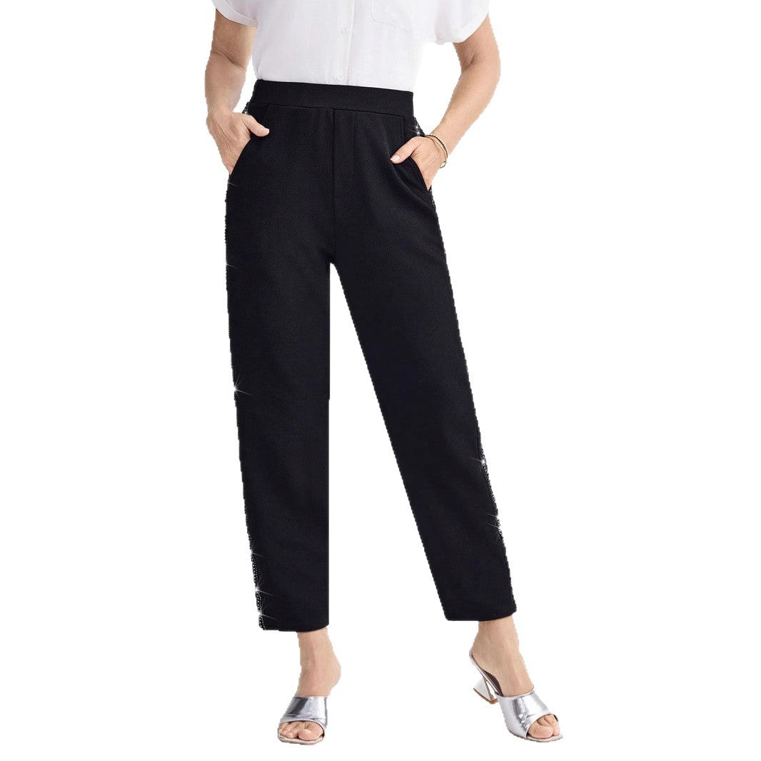 Women Elegant straight-cut fabric pants with elastic waistband and side glitter trim Mune Fashion