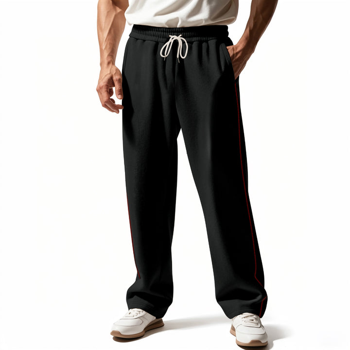 Men's casually fitting sweatpants with side decorative seam, elastic comfort waistband, and deep side pockets Mune Fashion