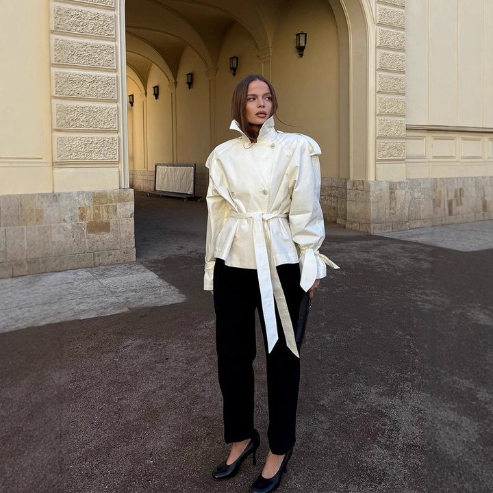 Women’s cropped double-breasted trench coat with waist belt, voluminous sleeves, and knot cuffs Mune Fashion