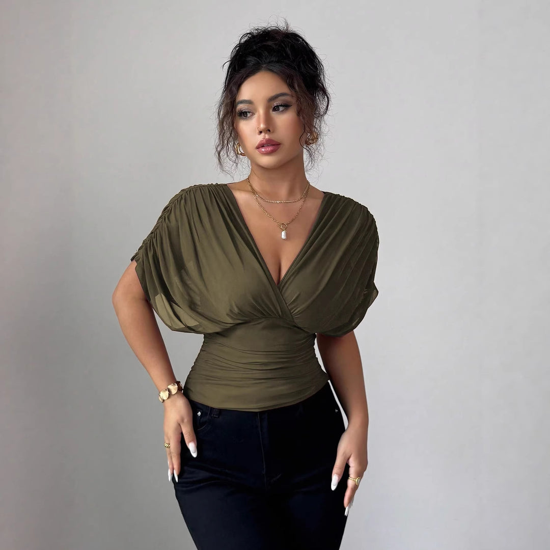 Women's fitted wrap top with deep V-neck and gathered wing sleeves Mune Fashion