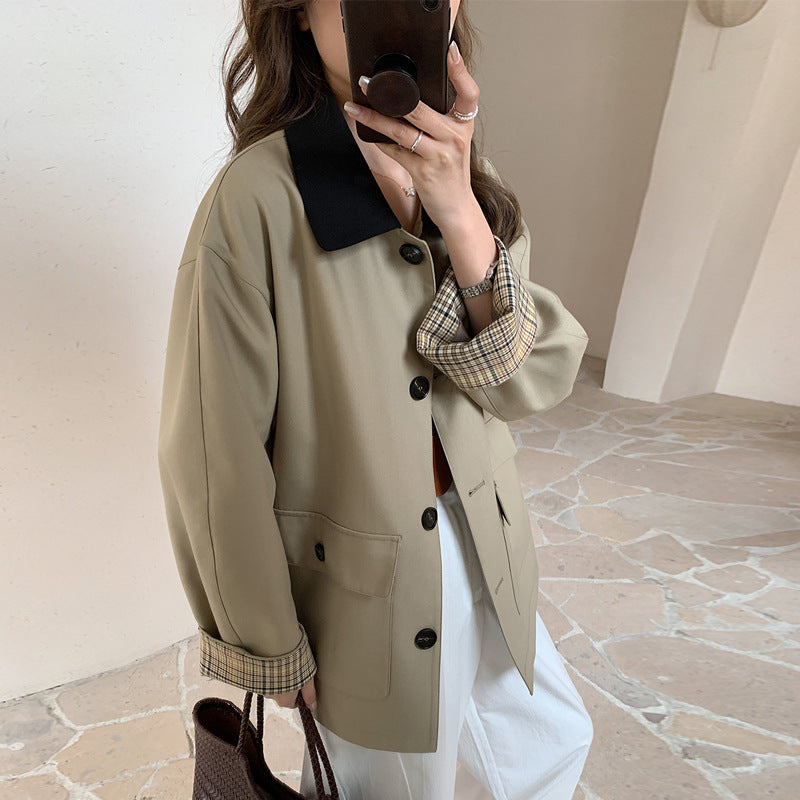 Women loosely fitted transitional jacket with contrasting collar and checked sleeve cuffs Mune Fashion