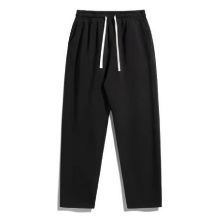 Unisex casual straight-leg joggers with elastic comfort waistband, contrasting drawstring and side pockets Mune Fashion