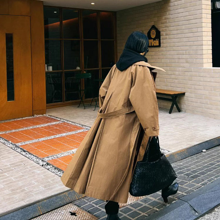 Women's Maxi Length Trench Coat with Oversized Shoulder Yoke, Waist Belt, and Voluminous Sleeves Mune Fashion