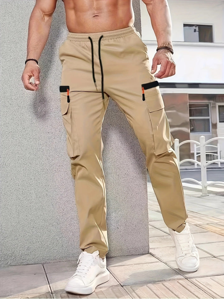 Men's cargo pants in jogger style with elastic waistband, drawstring & multiple pockets Mune Fashion