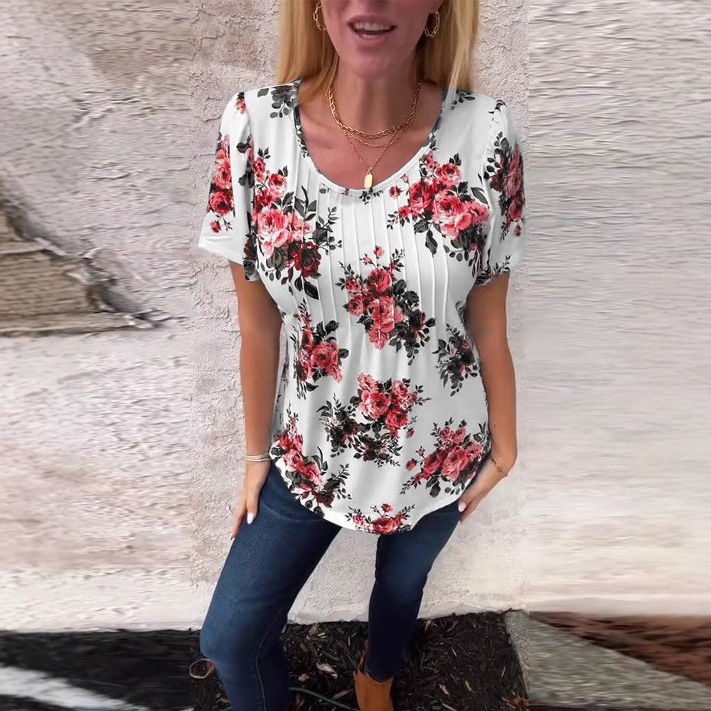 Ladies cropped short sleeve blouse shirt with box pleats and floral print Mune Fashion