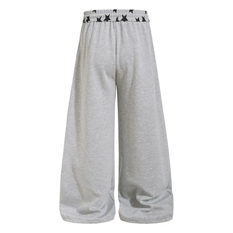 Women's extra wide palazzo sweatpants with comfort waistband, drawstring and star appliqué Mune Fashion