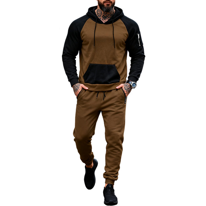 Men's two-piece hooded sweat set with raglan sleeves, sleeve zip pocket, and tapered jogging pants Mune Fashion